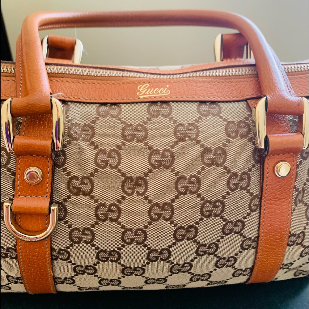 Authentic Orange canvass Gucci.